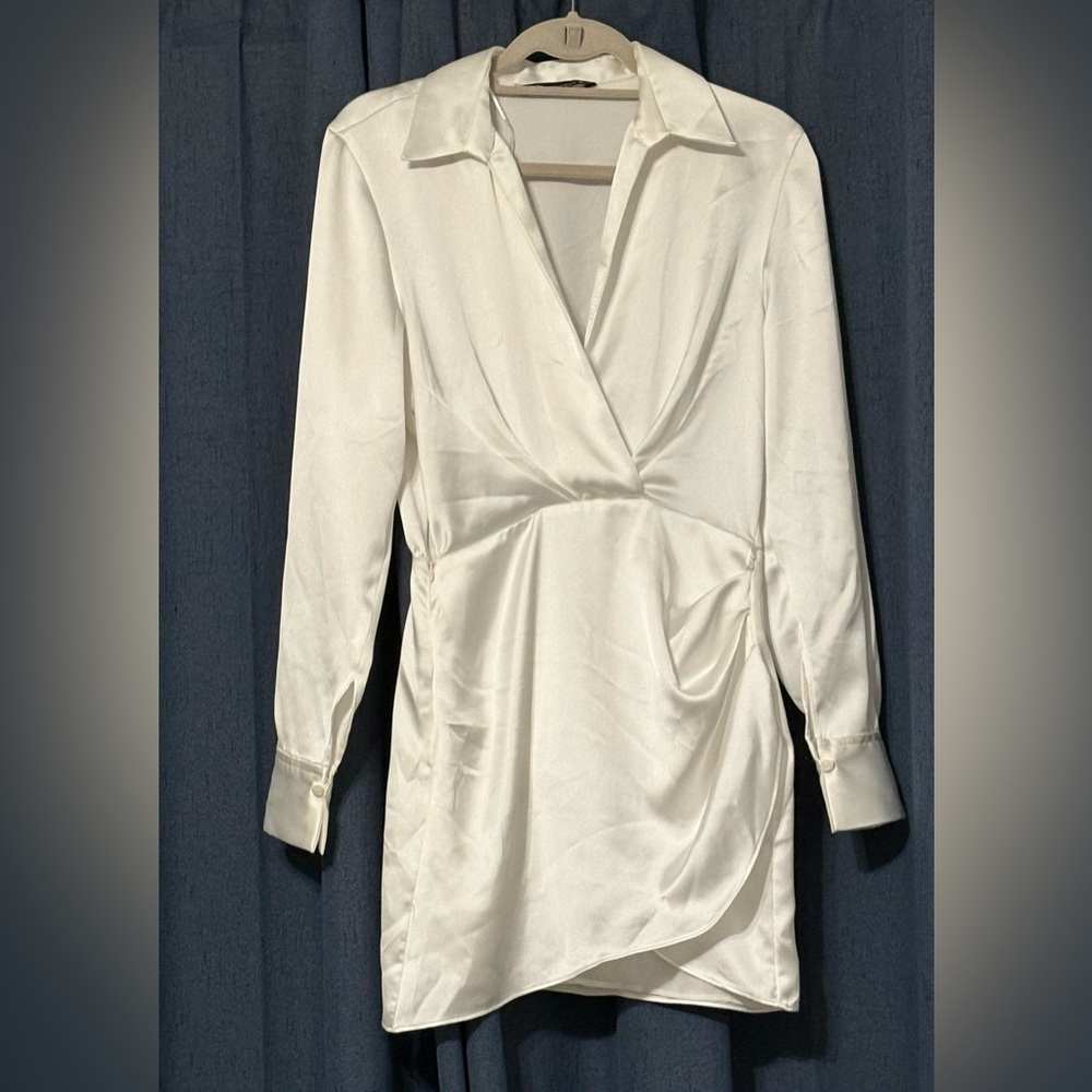 White satin long sleeve mini dress.